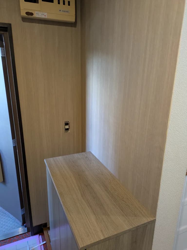 施工後 ── 造作棚を備えた玄関収納